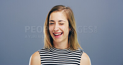 Buy stock photo Wink, smile and support with portrait of woman in studio for secret, agreement and joy. Happiness, feedback and thank you with female person on background for review, achievement and well done sign