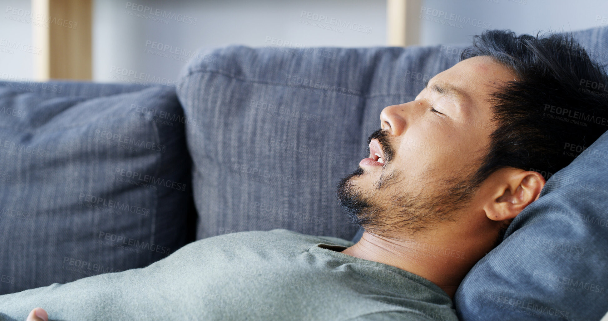 Buy stock photo Tired, Asian man and sleeping at house with dream, weekend break and burnout for nap wellness. Asleep, male person and fatigue with exhaustion, overworked and comfort of stress relief for self care