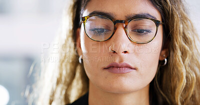 Buy stock photo Closeup, reading or woman with glasses in office for newspaper article, report information and research. Reflection, face and female journalist with eyewear, news or review for journalism project