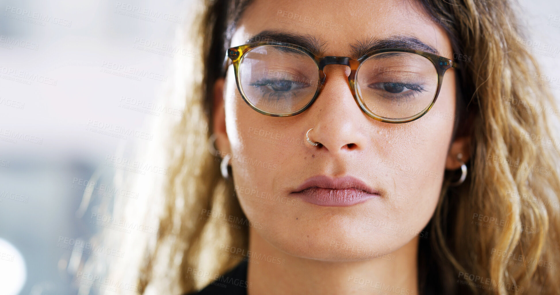 Buy stock photo Closeup, reading or woman with glasses in office for newspaper article, report information and research. Reflection, face and female journalist with eyewear, news or review for journalism project