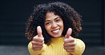 Thumbs up, happy and portrait of woman in city with hand gesture for success, support and approval. Smile, urban town and person with emoji, sign and symbol for agreement, good news and okay outdoors