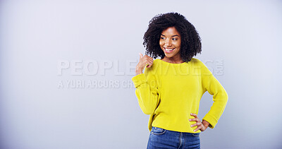 Buy stock photo Smile, woman and student for pointing in studio of college announcement, scholarship news or sign up. African, female person and mockup space of education steps, information guide and blue background