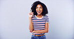 Surprised, woman and student pointing in studio with college announcement, scholarship news and sign up. African, person and show direction with education offer, information guide and blue background