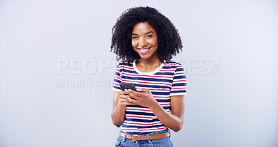Buy stock photo Woman, portrait or internet on phone in studio for social media or online dating, sign up or mockup space. Student person, mobile or excited for contact, results or match success on gray background