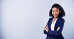 Business woman, happy and arms crossed for portrait in studio for accounting, career and confidence. African accountant, gray background and smile for corporate job, mockup space and promotion
