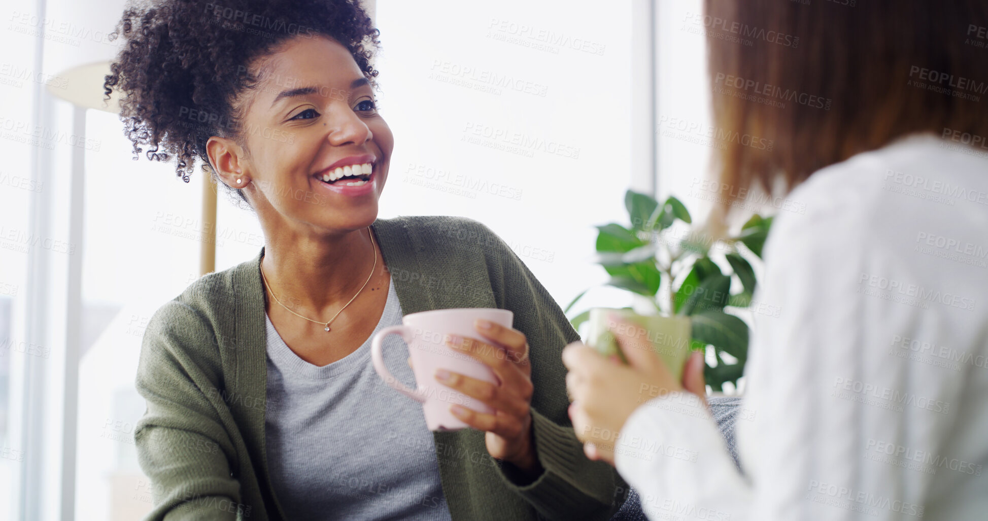 Buy stock photo Home, coffee and women on sofa, funny and bonding together in living room. People, apartment and friends with cappuccino, laughing and support with comfort, relax and weekend break with humor or joke
