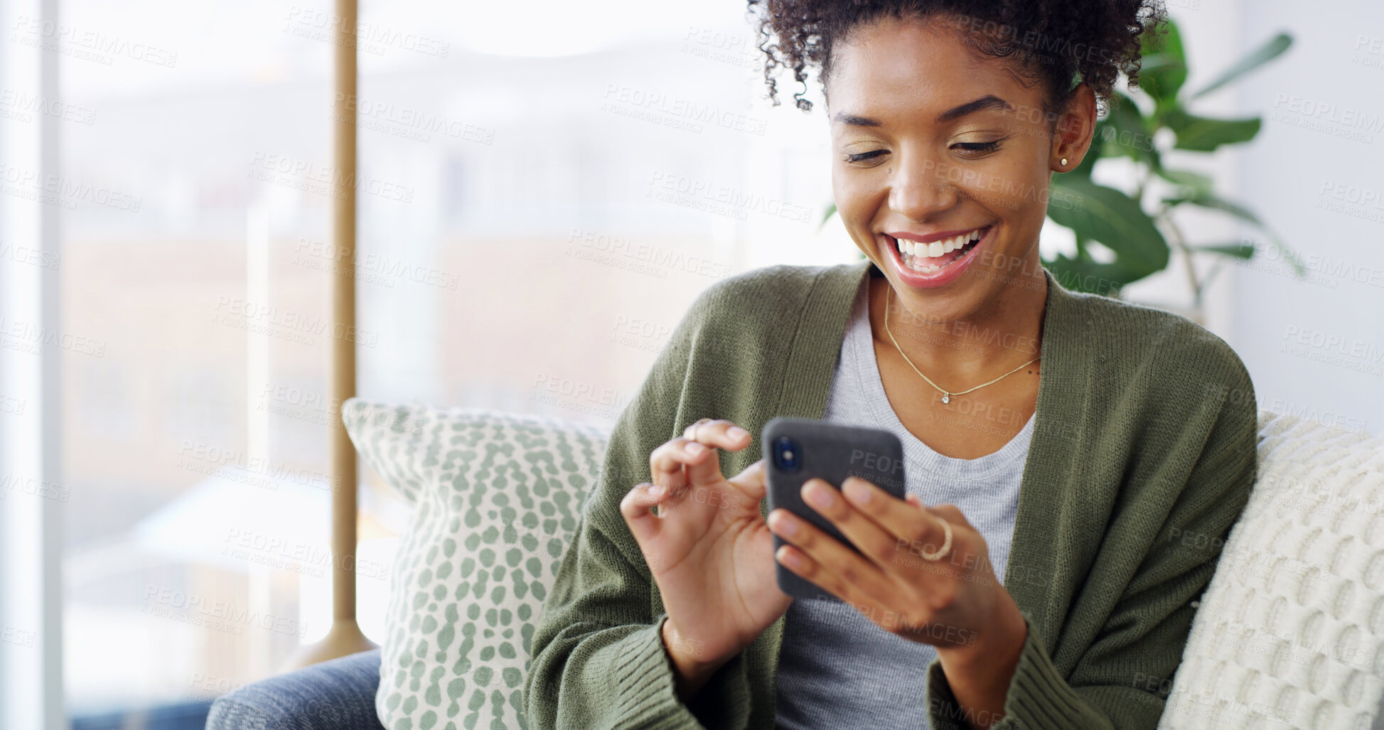 Buy stock photo Laugh, mobile and black woman in home online for relax, comedy and funny AI filter app. Smartphone, living room and happy girl on chat for communication, social media post and scroll meme on internet