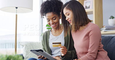 Buy stock photo Sofa, friends and tablet with credit card for ecommerce, payment and information on banking app. People, women and connection with tech for debit details, online shopping and web subscription at home