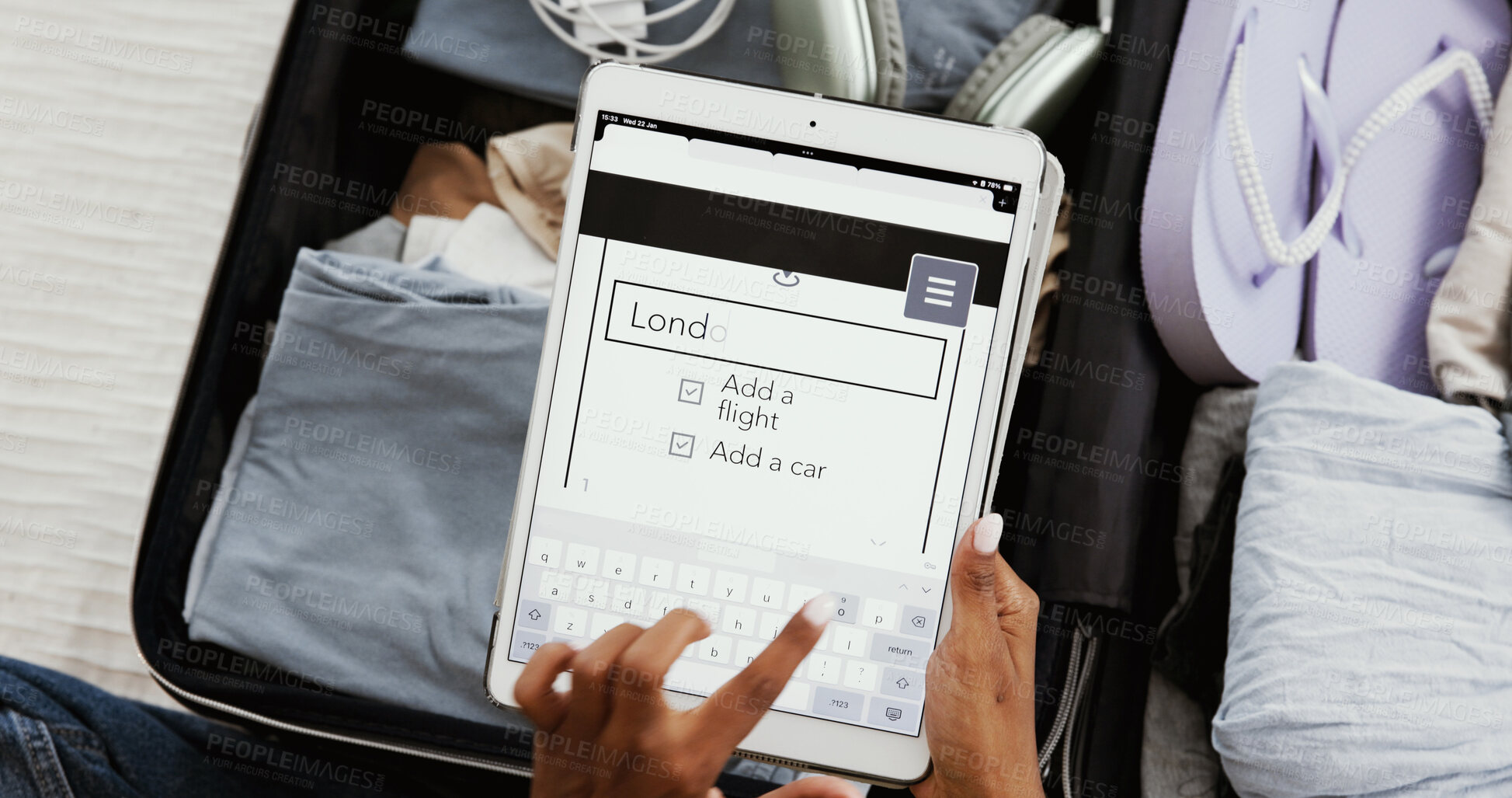 Buy stock photo Luggage, tablet screen and typing with hands of woman at home for app, booking and London destination. Flight, suitcase and above with person and search for departure, passport and travel schedule