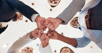 Buy stock photo Business, people and support with fist bump in office for corporate collaboration, target success or finance goals. Below, employees and hands together for funding approval and investment celebration
