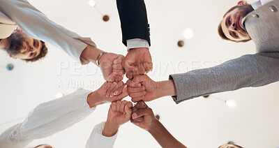 Buy stock photo Business, people and team building with fist bump in office for corporate support, collaboration success or target goals. Below, employees and hands together for company solidarity and partnership