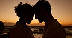 Face touch, beach and silhouette of couple at sunset for bonding, relationship and relax on weekend. Dating, travel and man and woman by ocean for romance on holiday, vacation and love in nature
