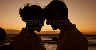 Buy stock photo Face touch, beach and silhouette of couple at sunset for bonding, relationship and relax on weekend. Dating, travel and man and woman by ocean for romance on holiday, vacation and love in nature