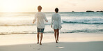 Back, beach and couple with love, running and energy with weekend break, honeymoon and marriage. Vacation, seaside and man with woman, ocean or romance with relationship, travel or bonding together