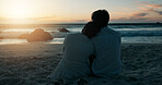 Sunset, back and couple for relax on beach, vacation holiday or bonding together for anniversary date. Ocean, man and woman with peace for love embrace, travel adventure or connection in relationship