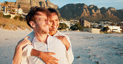 Buy stock photo Happy couple, vacation and embrace at beach for love, care and interracial relationship together. Seashore, man and woman hug outdoor for summer holiday, travel or romantic date with partner for view