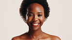 Beauty, happy and portrait of black woman in studio for dermatology, cosmetics and glow. Shine, self care and Collagen with person on white background for spa treatment and skincare benefits 