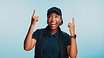 Delivery, studio and black woman point up for branding, export and shipping news or post mockup space. African person, courier and commercial shipment with choice or sale discount on blue background