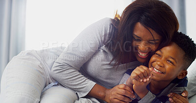 Buy stock photo Smile, mom and hug kid in home for love, care and family bonding together. African child, mother and cuddle boy in bedroom for connection, relax and support in healthy relationship with single parent