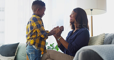 Buy stock photo Talking, mom and child in living room, smile and black family in house, conversation and affection for boy. Home, woman and love for son in morning, relax and parent with kid in apartment or happy