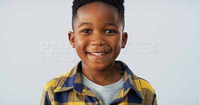 Buy stock photo Portrait, happy black child and boy in studio with calm adorable model isolated on white background. Face, smile and young African kid with confidence, positive and growth for development in Nigeria