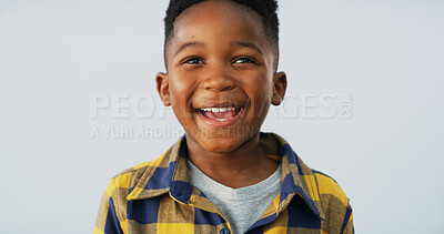 Buy stock photo Boy, child and happy with face in studio, elementary school student excited and ready for education. African kid, smile and cool confidence for growth, youth space and learner on white background