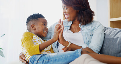 Buy stock photo High five, mom and child in living room, smile and black family in house, love and affection for boy. Home, woman and hug for son in morning, mother and parent with kid in apartment or happy on couch