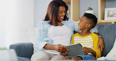 Buy stock photo Tablet, relax and mom with child on sofa playing educational game online for learning. Happy, bonding and mother with boy kid on digital technology for entertainment in living room in home together.