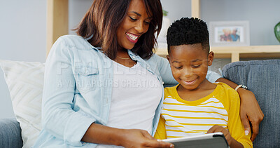 Buy stock photo Tablet, relax and mom with kid on sofa playing educational game online for learning. Happy, bonding and mother with boy child on digital technology for entertainment in living room in home together.