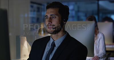 Buy stock photo Overtime, sales or businessman in call center with computer, communication or help in night. Virtual assistant, consultant or customer service agent with mic headset, online support or loan advice