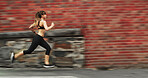 Running, workout and woman on street, fitness and practice for marathon in morning, exercise and blurred. Outdoor, runner and person on road for sports, athlete and training with energy for speed