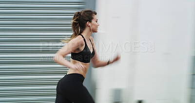 Buy stock photo Running, fitness and woman on street, city and practice for marathon in morning, exercise and blurred. Healthy, runner and person on road for workout, athlete and training with energy for sports