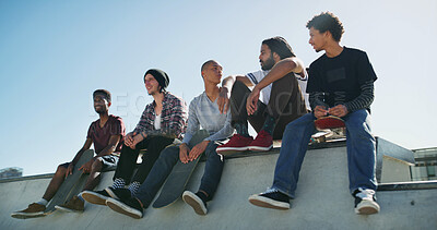 Buy stock photo Skateboard, group and friends outdoor on ramp for relax, bonding or sports break. Skate park, talking and men together for holiday, resting or hangout for conversation with cool fashion or streetwear