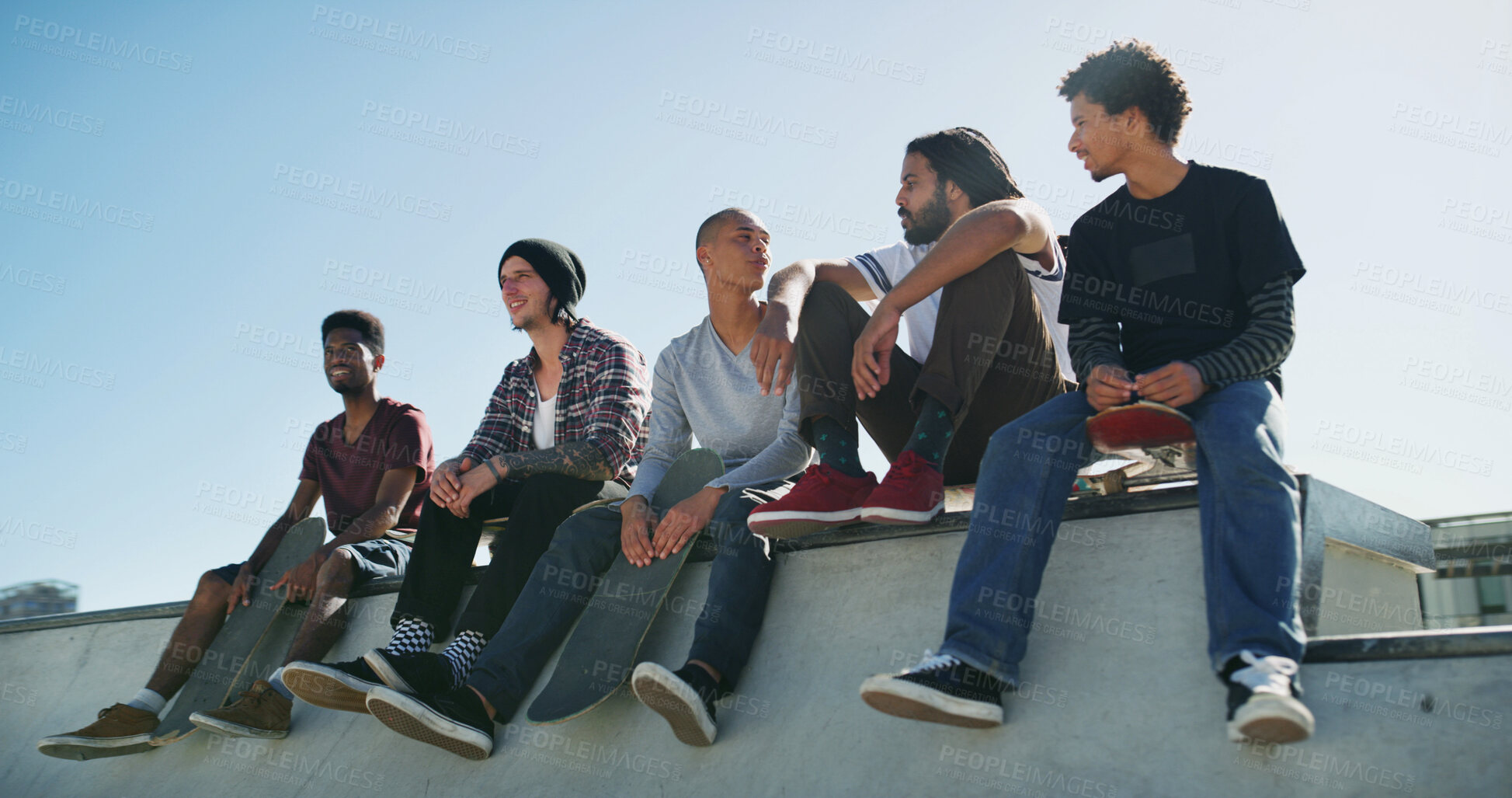 Buy stock photo Skateboard, group and friends outdoor on ramp for relax, bonding or sports break. Skate park, talking and men together for holiday, resting or hangout for conversation with cool fashion or streetwear