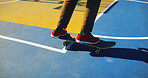 Skateboard, feet and skater learning trick for outdoor hobby, activity or challenge at park. Sports, gen z and legs of person with sneakers for skating training with skills for competition in city.