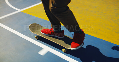 Buy stock photo Skateboard, sneakers and person learning trick for outdoor hobby, activity or challenge at park. Sports, gen z and legs of skater with shoes for skating training with skills for competition.