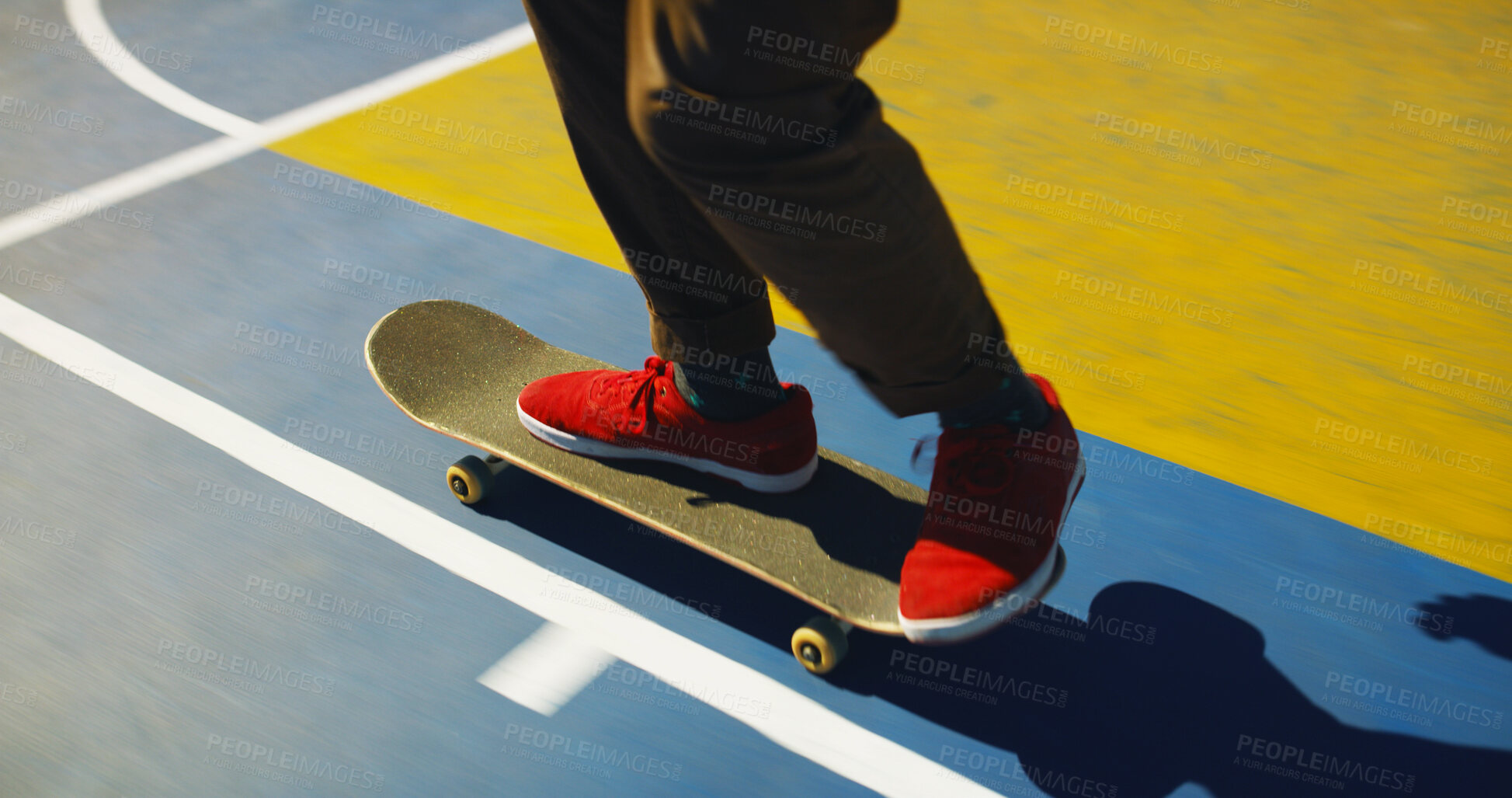Buy stock photo Skateboard, sneakers and person learning trick for outdoor hobby, activity or challenge at park. Sports, gen z and legs of skater with shoes for skating training with skills for competition.