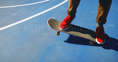 Buy stock photo Skateboard, skill and person learning trick for outdoor hobby, activity or challenge at park. Sports, feet and legs of skater with sneakers for skating training for competition with freestyle in city