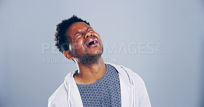 Buy stock photo Grief, man and sad with crying in studio for broken heart, emotional and mourning loss. Mockup, black person and unhappy on gray background with sorrow, depression and pain from trauma or bad news