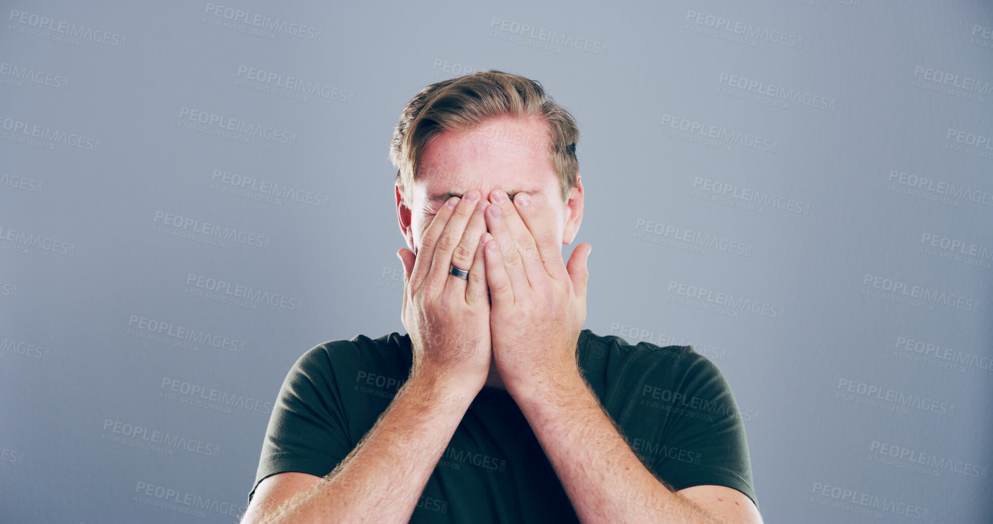 Buy stock photo Grief, man and crying emotion in studio with divorce fail, broken heart and bad news. Mockup space, sad and male person with depression, marriage mistake and ptsd for trauma memory on gray background