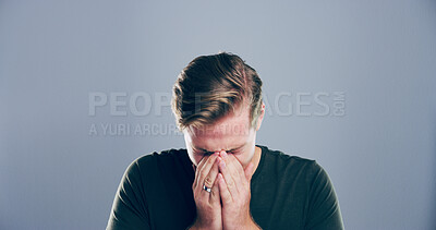 Buy stock photo Sad, man and crying emotion in studio with divorce fail, broken heart and bad news. Person with depression, mockup space and mistake with grief, mental health and ptsd for trauma on gray background