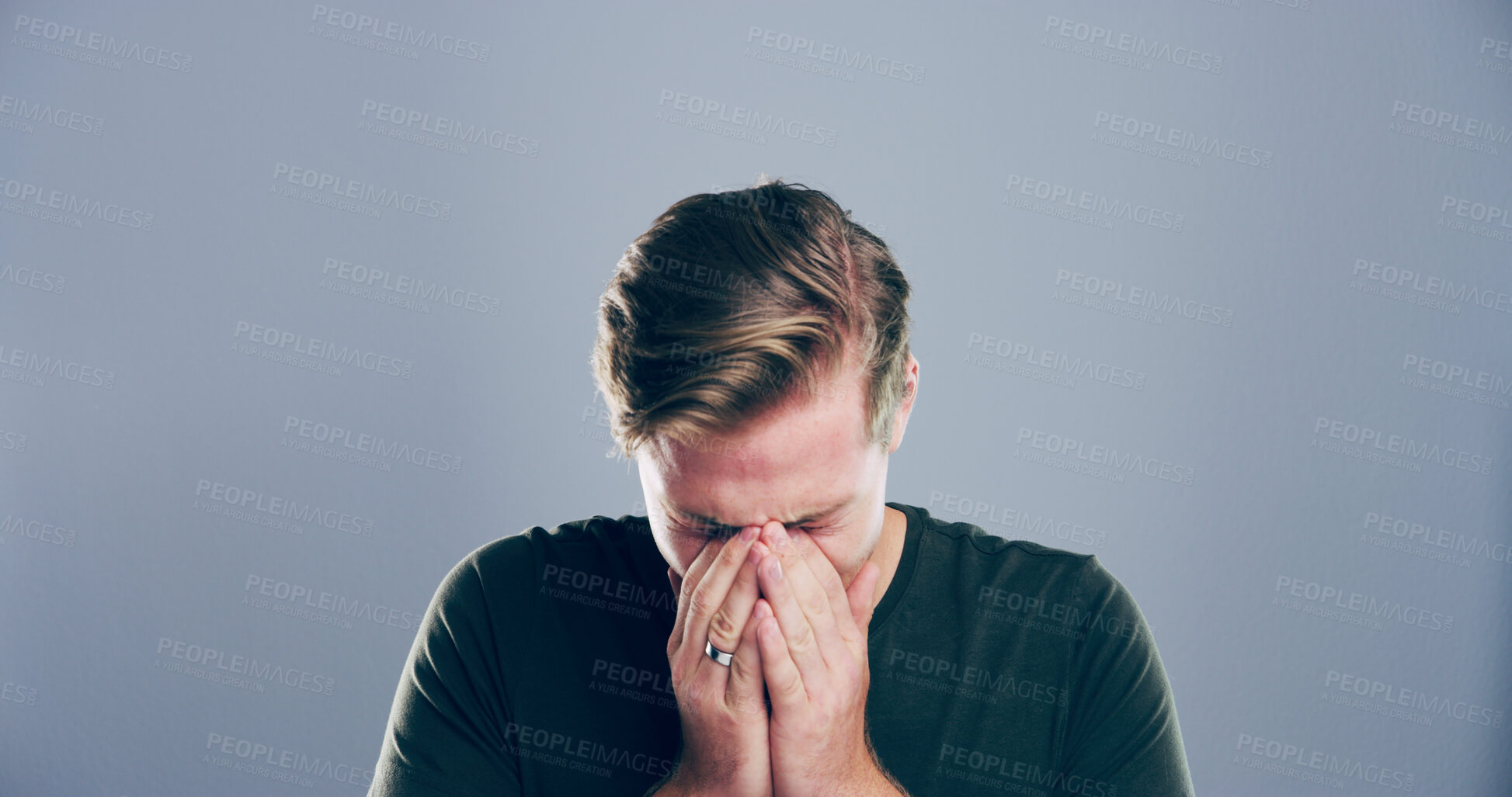 Buy stock photo Sad, man and crying emotion in studio with divorce fail, broken heart and bad news. Person with depression, mockup space and mistake with grief, mental health and ptsd for trauma on gray background