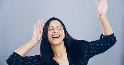 Buy stock photo Dance, energy and rave with happy woman in studio for celebration, clubbing or party fun. Music, motion and smile of excited dancer person on gray background mockup for beat, choreography or rhythm