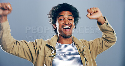 Buy stock photo Dance, fist pump and portrait of happy man in studio for celebration, clubbing or party fun. Energy, music and smile of excited dancer person on gray background for choreography, rhythm or success