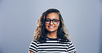 Confidence, creative and portrait of woman in studio with glasses, mockup space and gen z pride. Artist, graphic designer and happy face of small business professional on gray background with smile