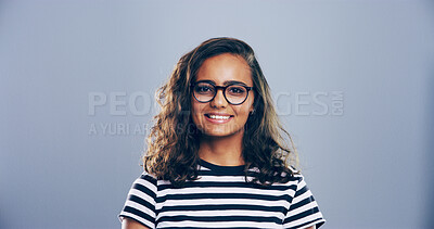 Buy stock photo Confidence, creative and portrait of woman in studio with glasses, mockup space and gen z pride. Artist, graphic designer and happy face of small business professional on gray background with smile