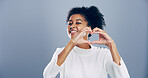 African student, portrait and heart hands with love emoji, gesture and support on grey background space in studio. Woman, smile and sign or shape, symbol and kindness for valentines day date mockup