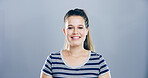 Confident, creative and portrait of woman in studio with smile, mockup space and gen z girl. Opportunity, ambition and happy face of university student on gray background with pride, relax and future