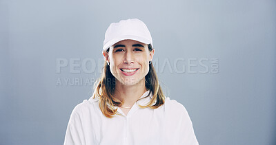 Buy stock photo Sports, cap and portrait of woman in studio with wellness, confidence and proud smile on mockup space. Fitness coach, tennis player or happy face of professional female athlete on grey background