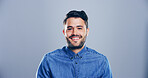 Portrait, space and student with smile of man in studio for development, education or learning. College, study and university learner with happy person on gray background mockup for back to school